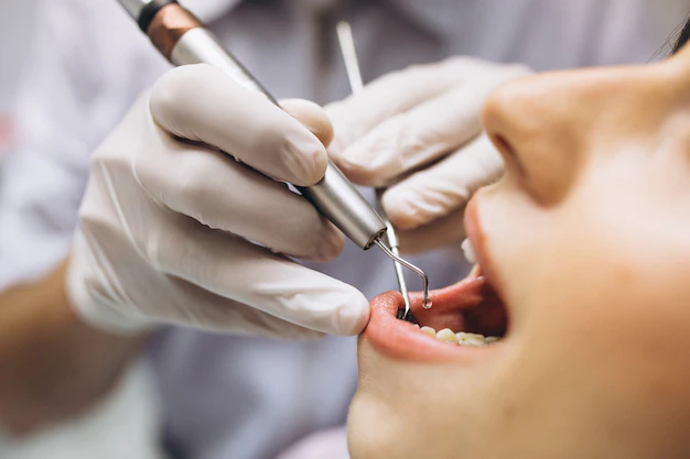 woman-patient-dentist_1303-9364.jpg